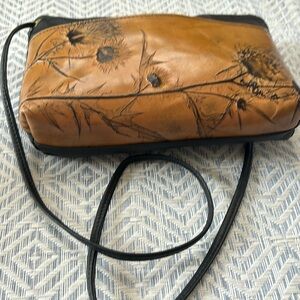 Cute little brown and black purse.